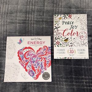 2 adult coloring books.
